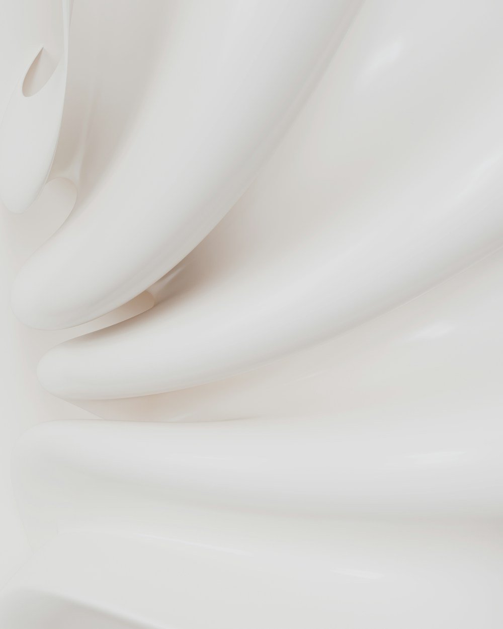 Close-up of velvety white cream swirls