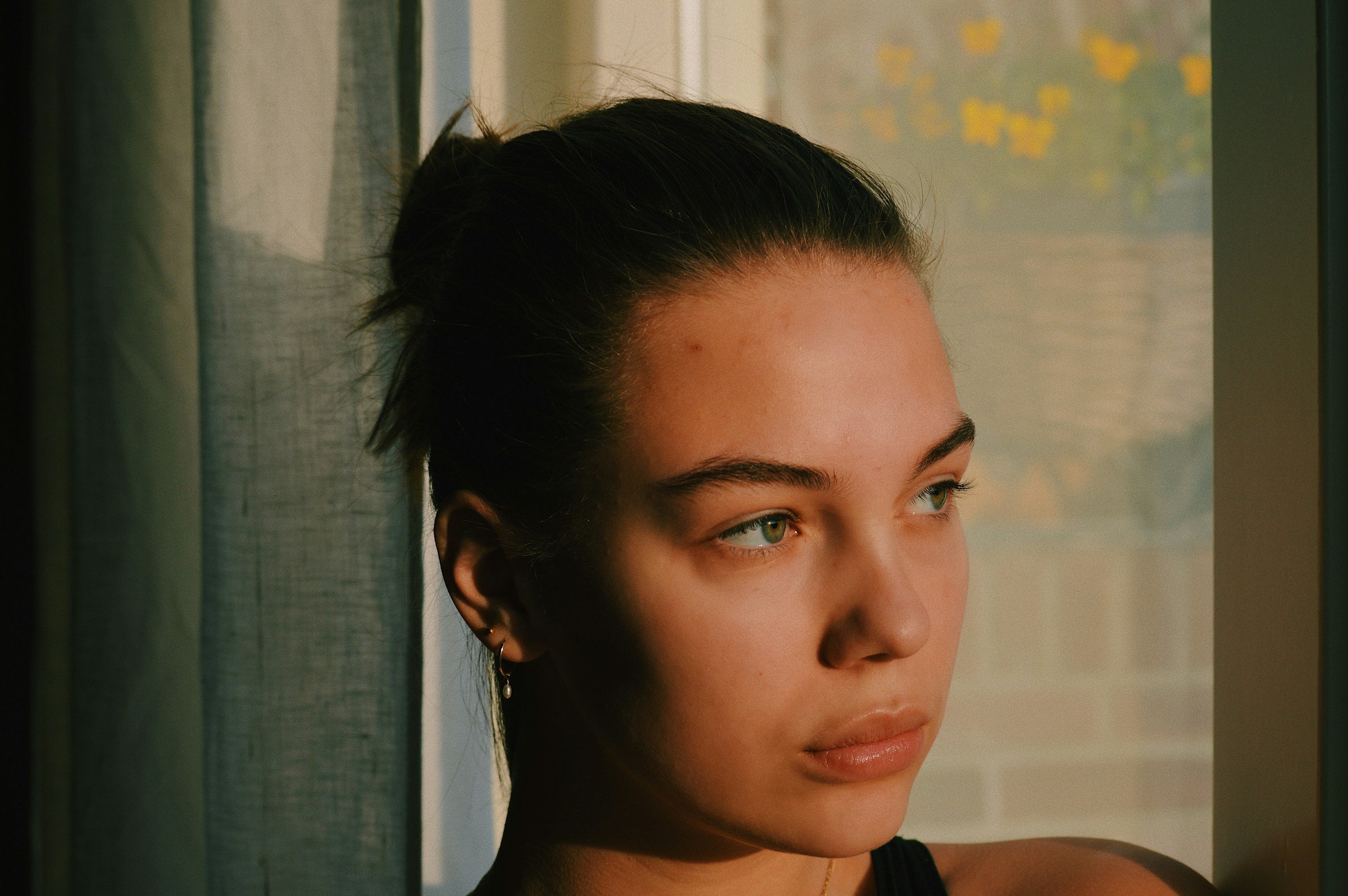 Portrait of woman in warm late-afternoon light